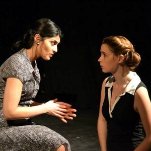 A scene from A View from the Roof, at The Arts Project, London, March 2014. In this monologue by Helen Weinzweig, adapted for stage by Dave Carley, Sudho Aysola plays Mother; Chelsea Benham is Daughter. Ashley Elizabeth Patenaude directed. Photo by Elizabeth Nash. 